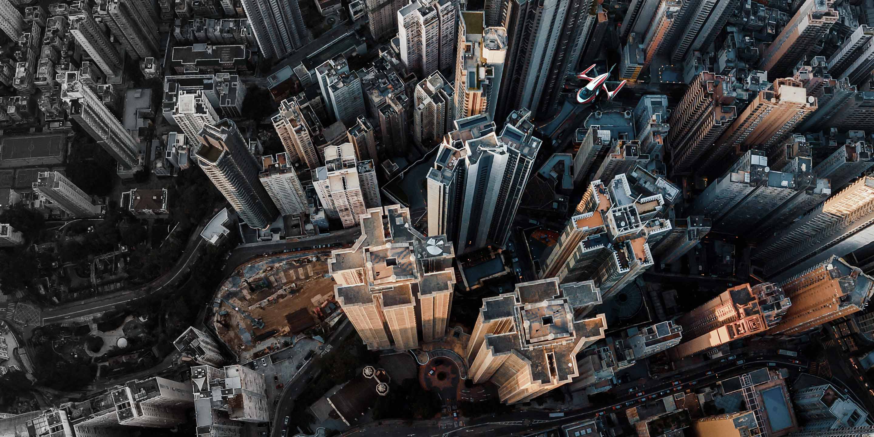 image of an aerial view of a city showcasing tall buildings and urban landscape