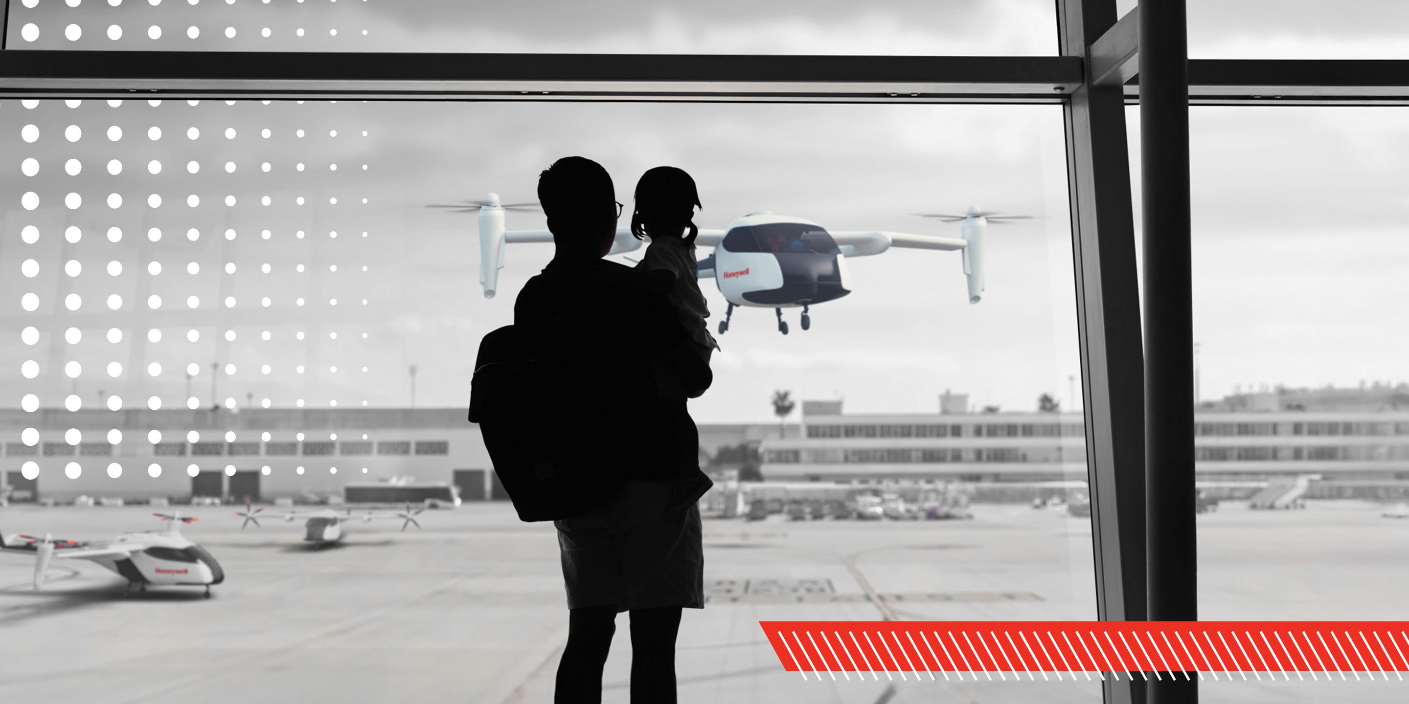 an image of a person holding a toddler while observing a drone from a window.