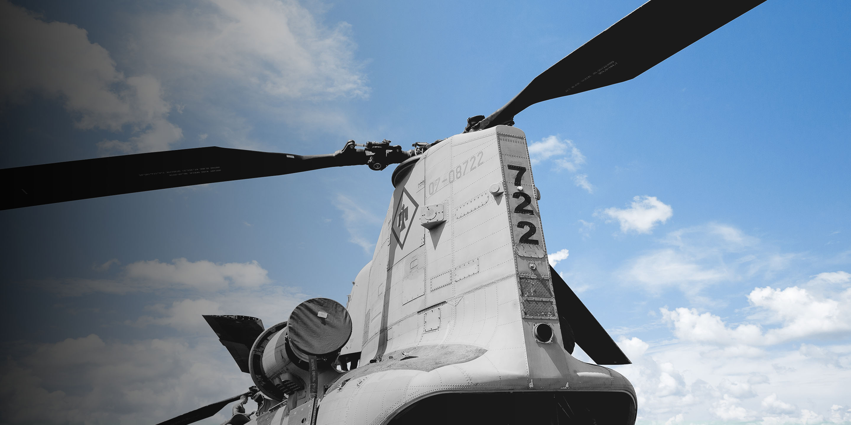 A Boeing Vertol CH-46 Sea Knight helicopter with a prominent top-mounted propeller, showcasing its military design.