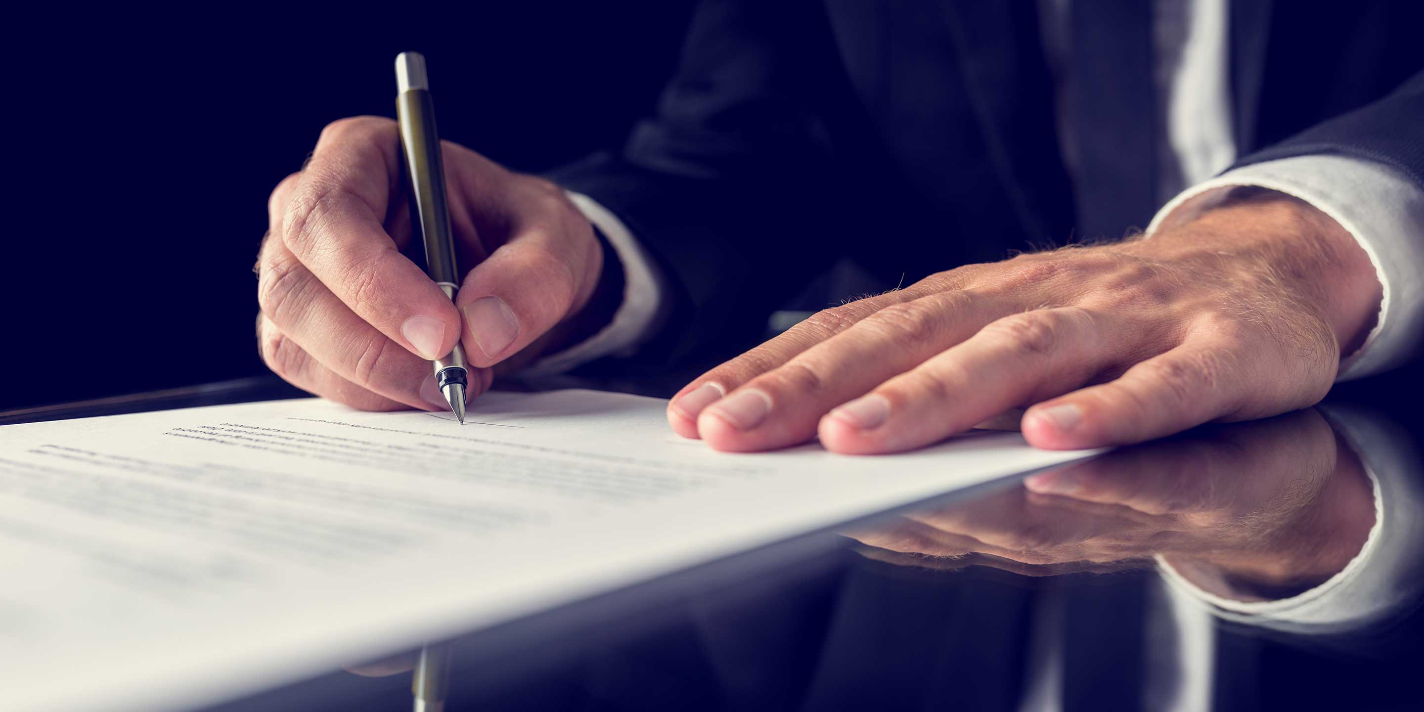 Business Man signing paper