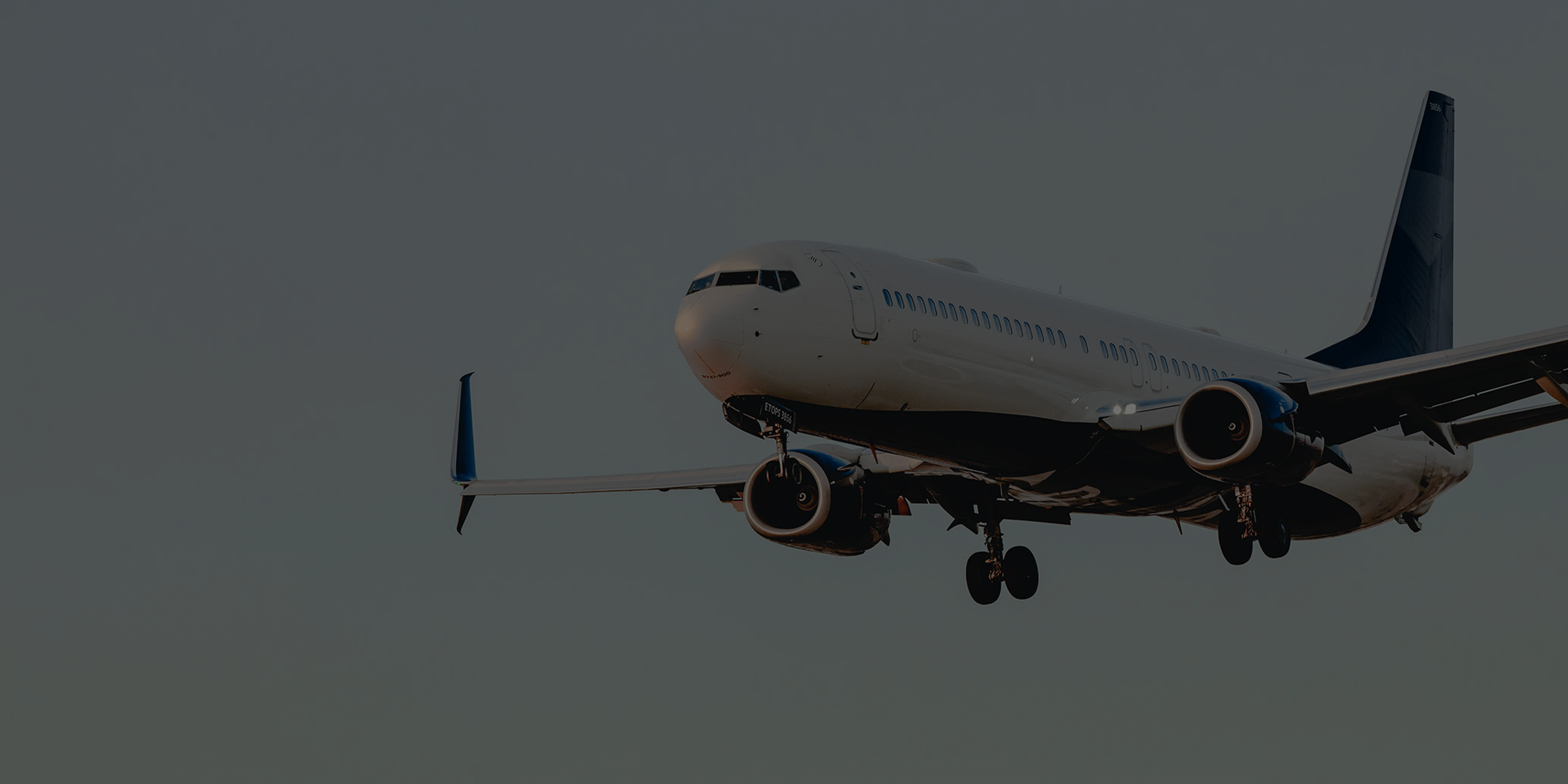 Commercial airplane gliding smoothly through the air.