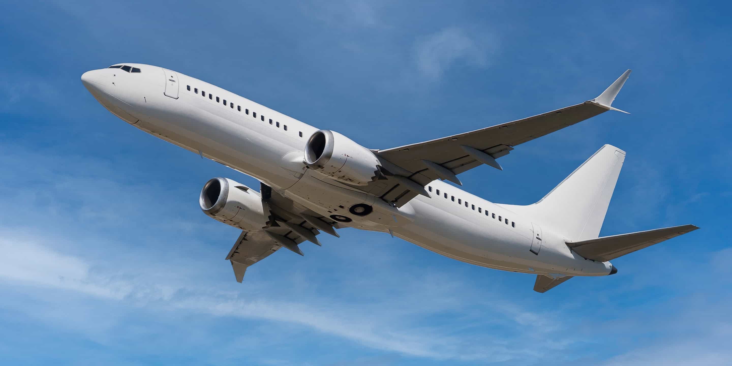 a Boeing passenger airplane flying high in the sky