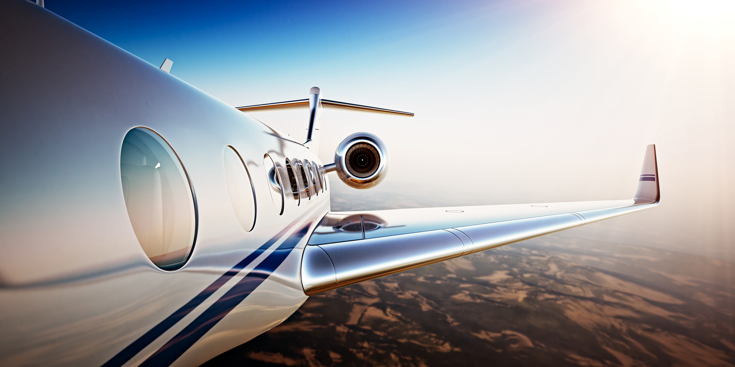 Photo of White Luxury Generic Design Private Jet Flying in Blue Sky at sunset.Uninhabited Desert Mountains Background.Business Travel Picture.Horizontal,Film Effect. 3D rendering
