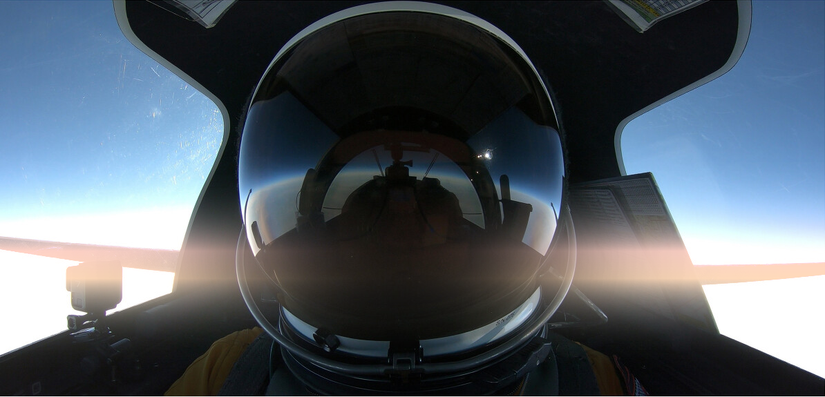 image of pilot helmet in jet